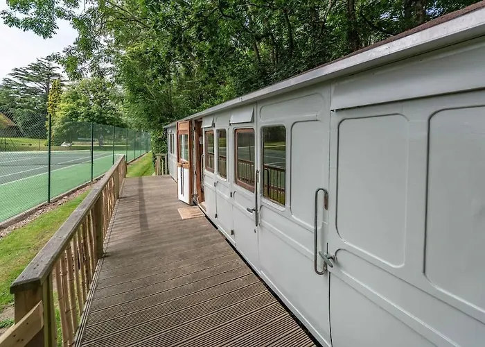 Railway Carriage Accommodation With Tennis Court!