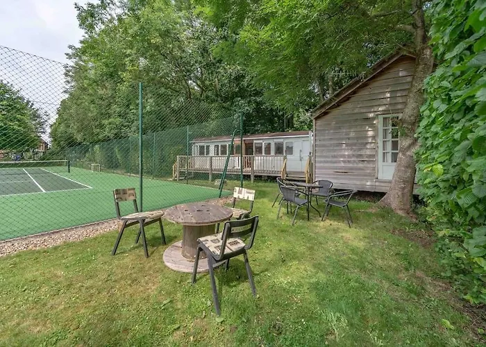 Railway Carriage Accommodation With Tennis Court!